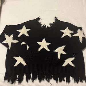 Cropped distressed sweater. BRAND: Storia SIZE: small COLOR: dark blue/white